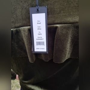 Woman's in olive color an blue top Rome an Juliet Couture